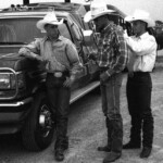 Cowboys get ready to compete by getting their numbers on. Mesquite Rodeo, Mesquite, TX